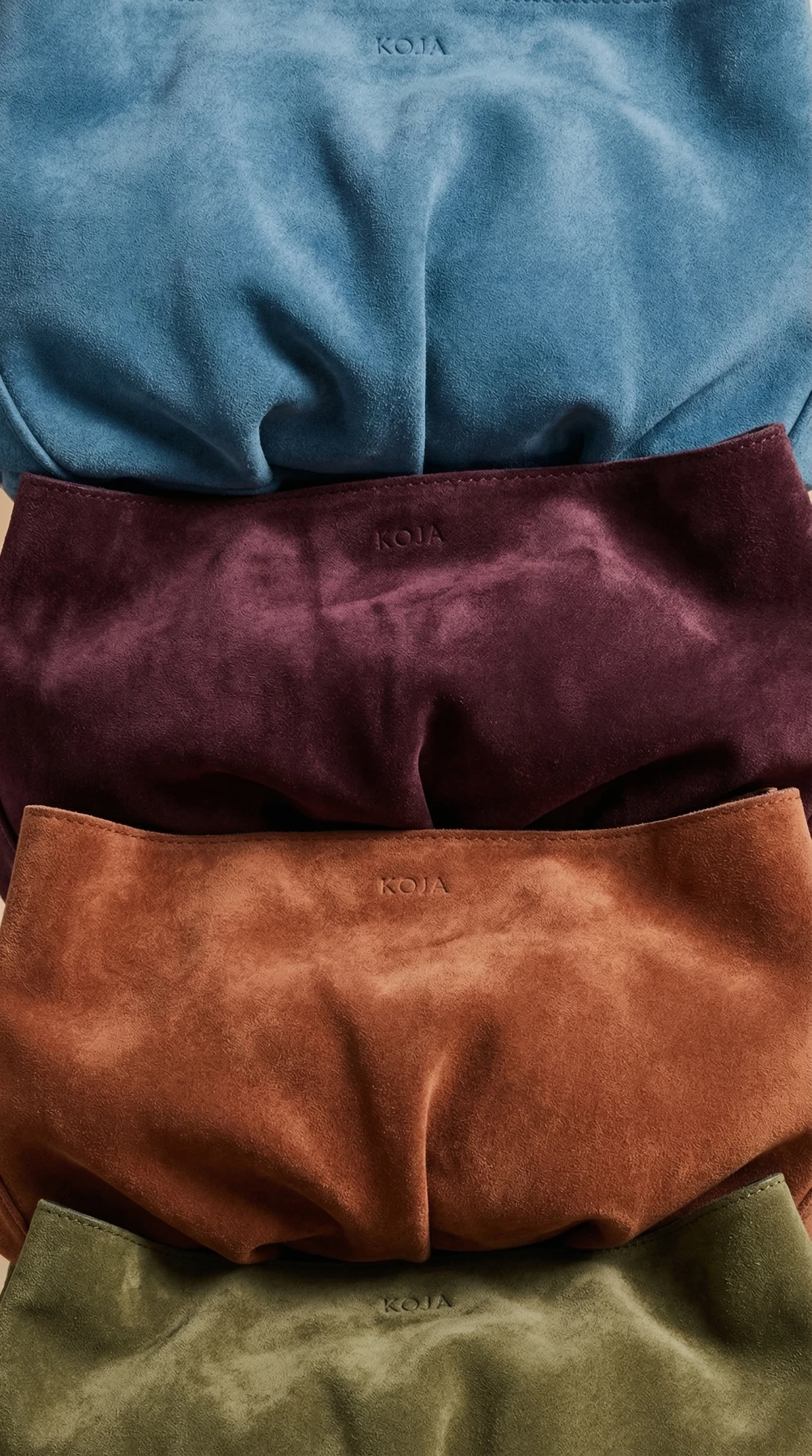 koja suede leather inanna clutch